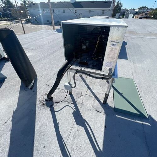 A commercial roof repair in progress.